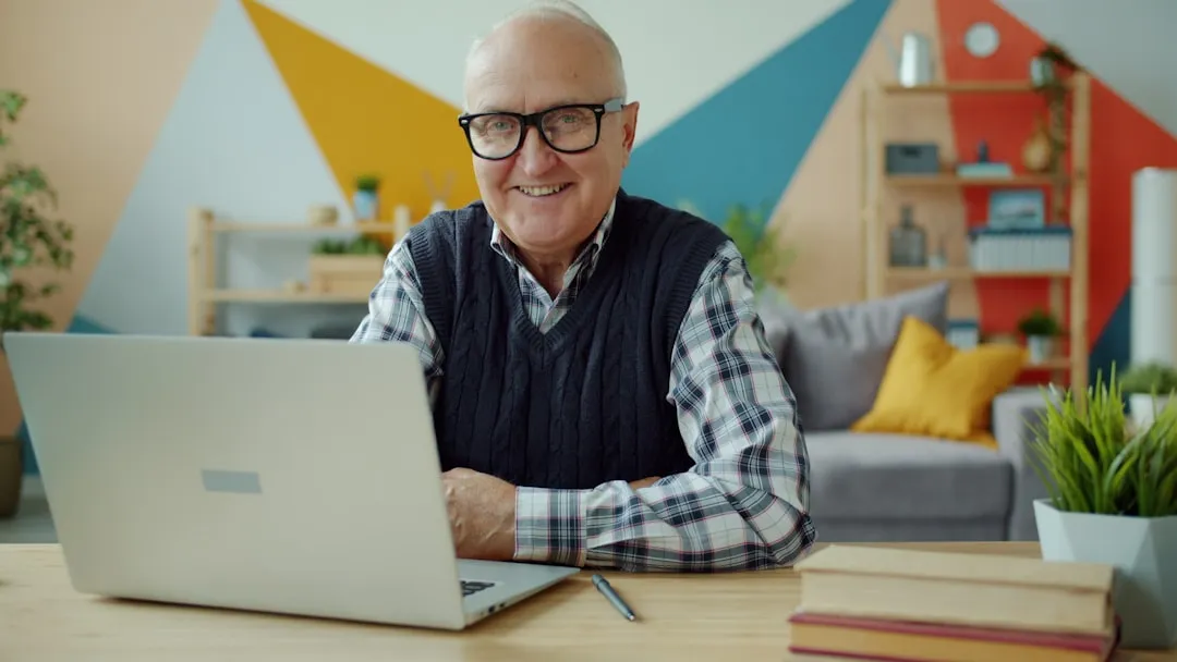 Older man using a laptop